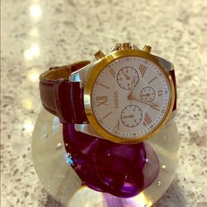 Fossil black and gold watch